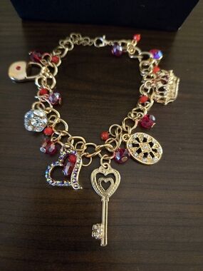 Gold-Tone Heart Key Charm Bracelet with Red Crystal Accents